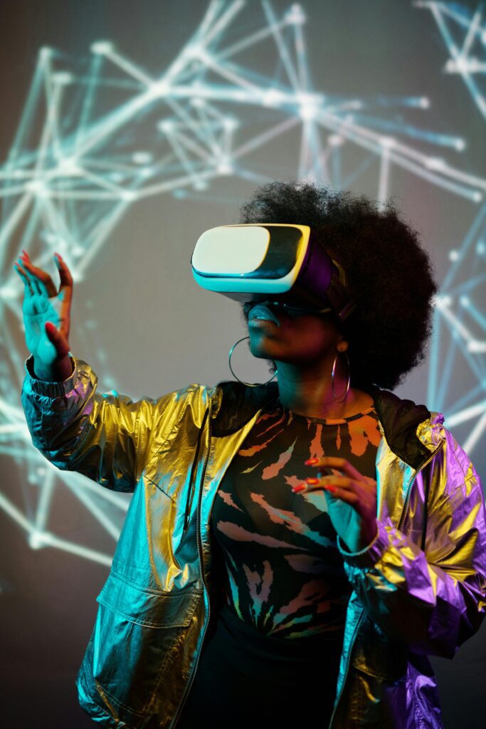 A Woman Wearing Vr Goggles While Standing Near a Background with Artwork